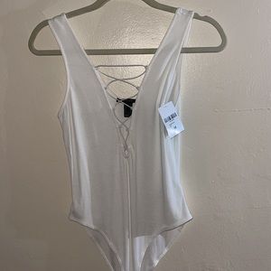 2 bodysuits for price of 1! White open bodysuit size M. orange bodysuit size L